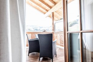 Camera da letto con balcone privato a Örtlhof